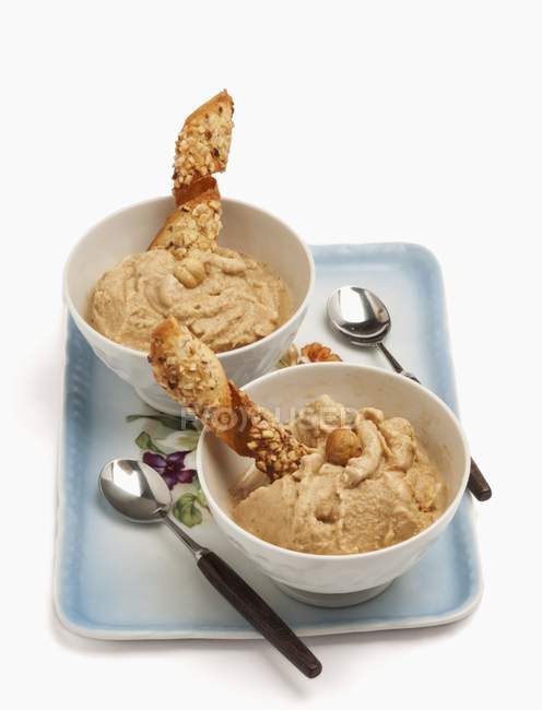 Hazelnut ice cream with wafer spirals — Stock Photo