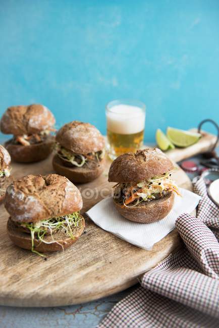 Hamburgers with pork and sprouts — Stock Photo