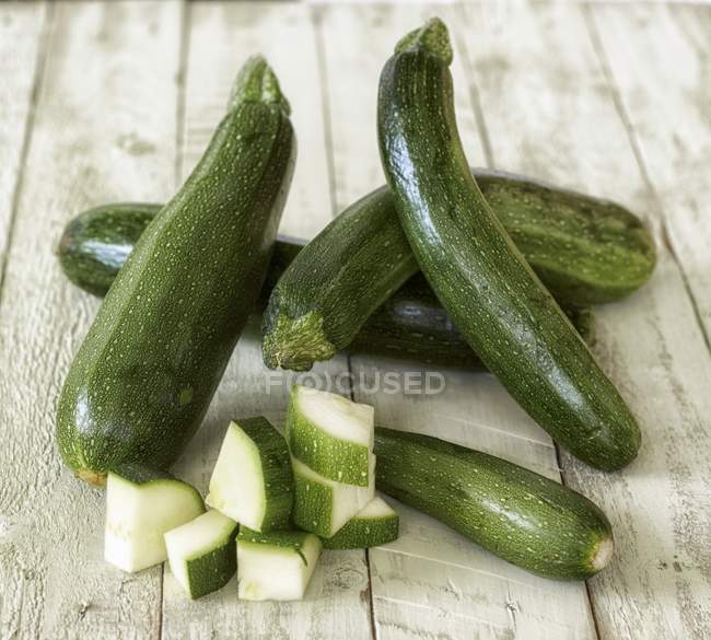 Fresh green Courgettes with slices — Stock Photo