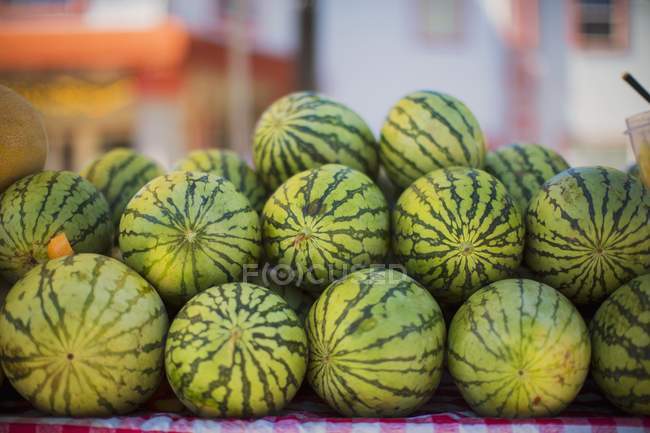 Ripe watermelons at marketplace — Stock Photo