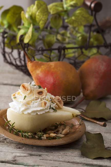 Pears with cream cheese — Stock Photo