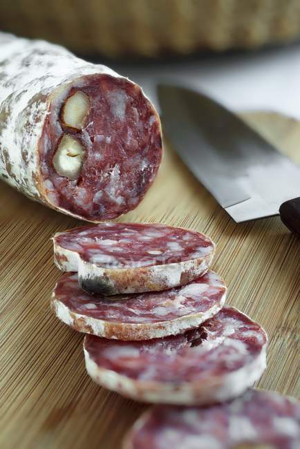 Sliced French hazelnut salami — Stock Photo