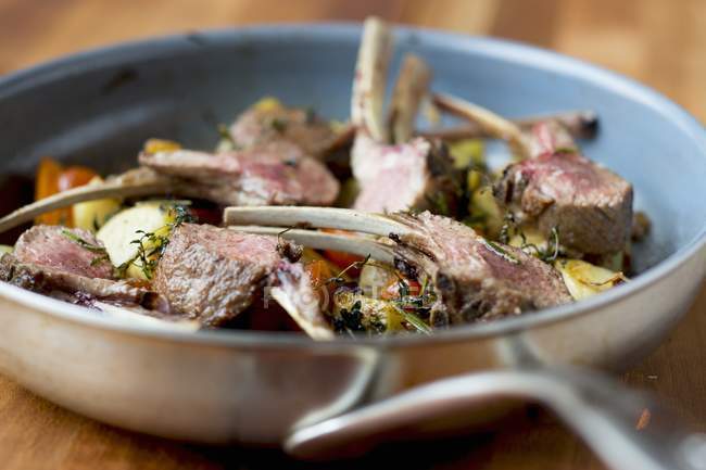 Lamb chops with oven-roasted vegetables — Stock Photo