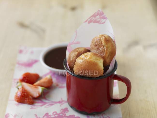 Mini doughnuts in a cup — Stock Photo