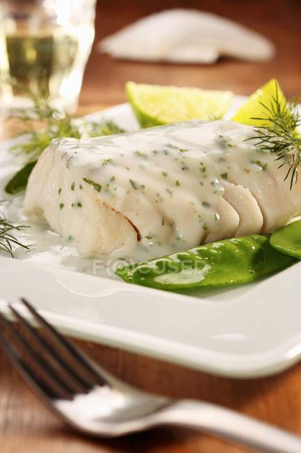 Fish fillet with sauce — Stock Photo