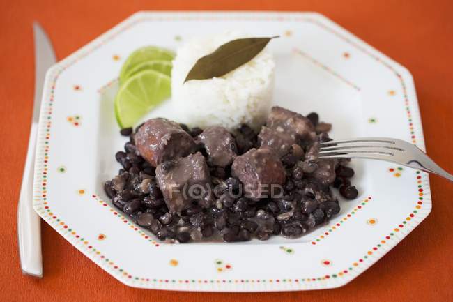 Feijoada dish of rice with stew — Stock Photo