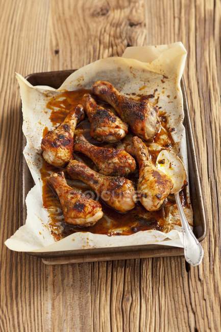 Spicy roasted chicken legs — Stock Photo