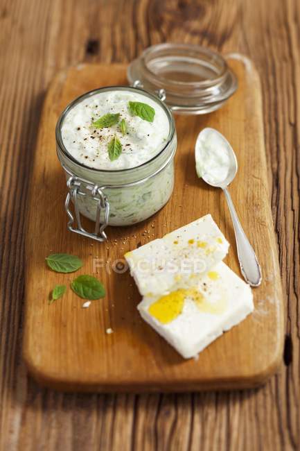 Tzatziki and feta cheese — Stock Photo