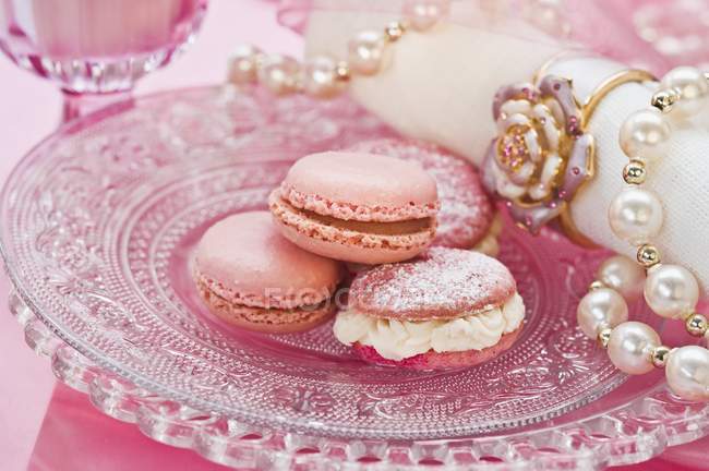 Pink macaroons on plate — Stock Photo