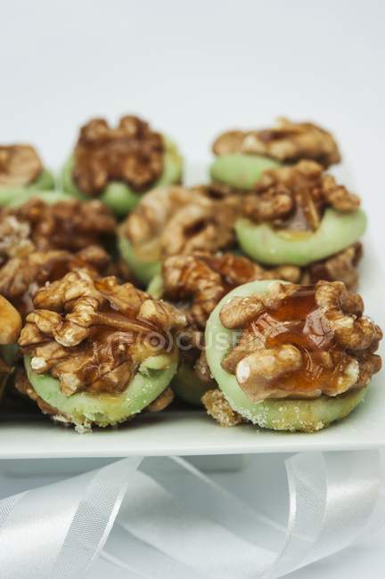 Caremalised walnuts with marzipan — Stock Photo