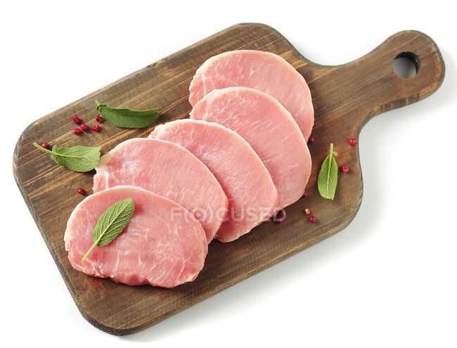 Biftecks de porc cru — Photo de stock