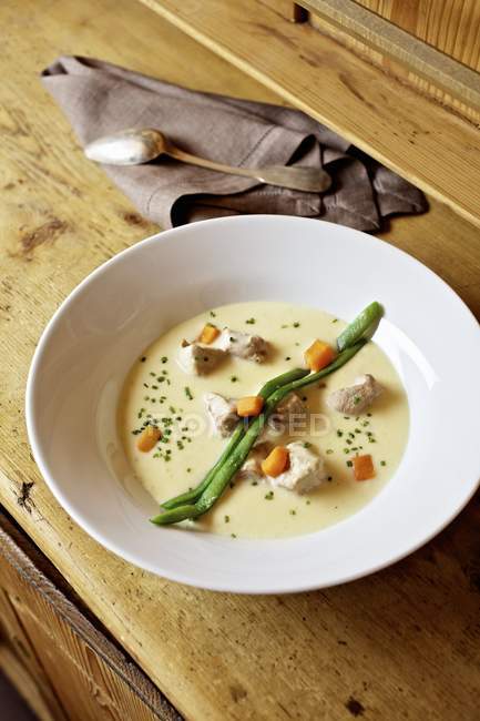 Clear soup with milk-fed veal — Stock Photo