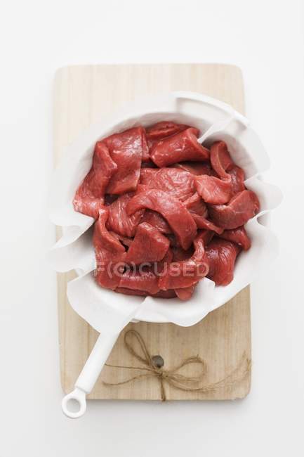 Strips of raw beef for frying — Stock Photo