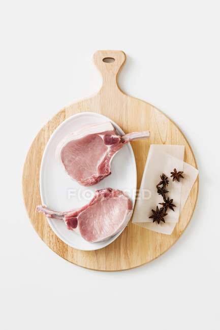 Pork chops and star anise — Stock Photo