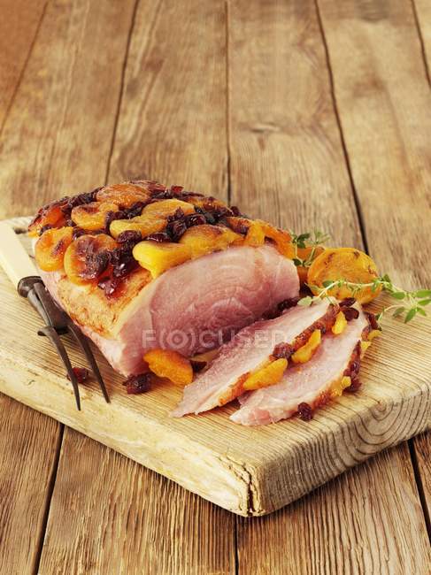 Roast pork with apricots — Stock Photo