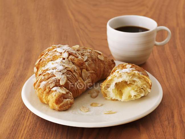 Croissants with slivered almonds — Stock Photo
