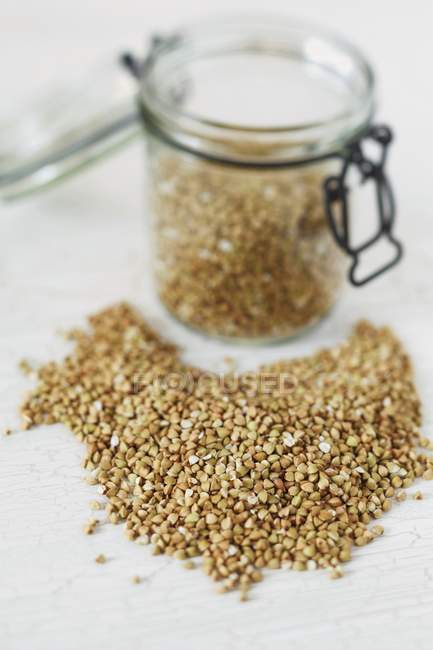 Buckwheat in storage jar — Stock Photo