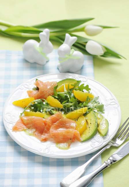 Salmon and avocado salad with oranges — Stock Photo