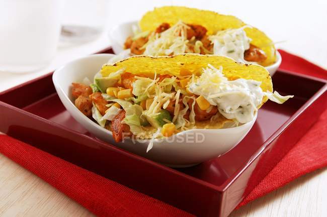 Tacos with vegetables and cream — Stock Photo