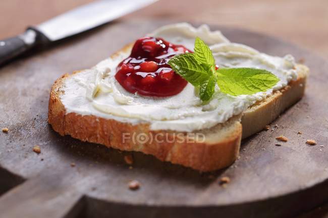 Slice of bread with cheese — Stock Photo