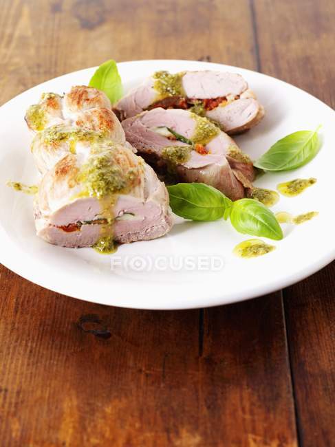 Stuffed pork fillet with basil — Stock Photo
