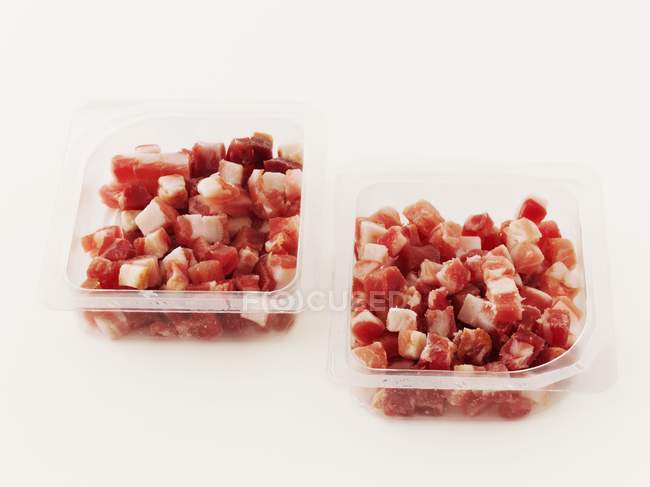 Closeup view of diced Pancetta in plastic packaging — Stock Photo