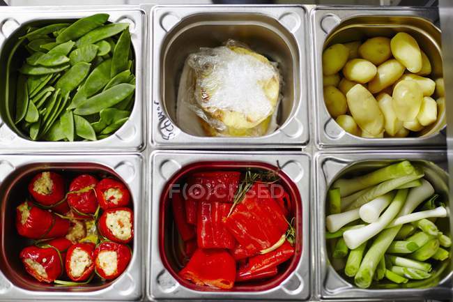 Various types of vegetables in bain maries — Stock Photo