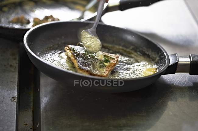 Butter being poured — Stock Photo