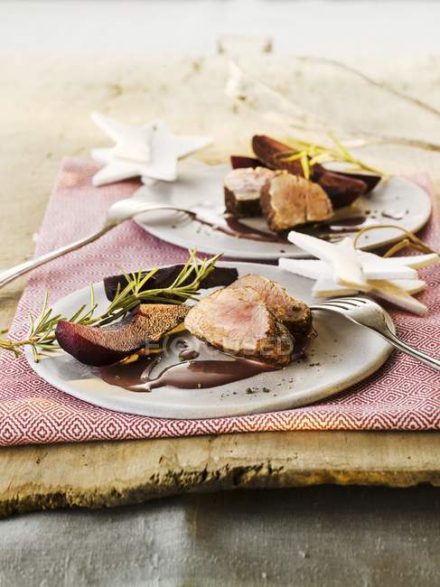 Pork fillet with elderberry pears — Stock Photo
