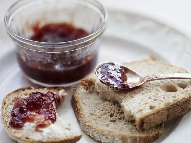 Bread with butter and jam — Stock Photo