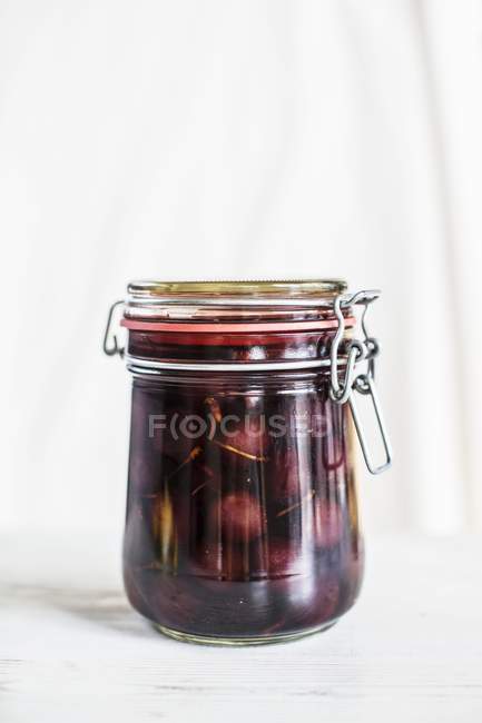 Jar of cherry compote — Stock Photo