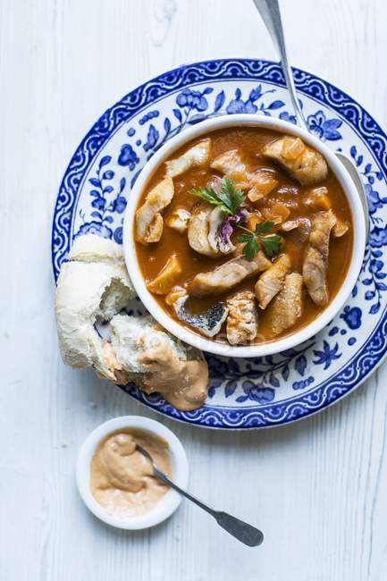 Fish soup with bread — Stock Photo
