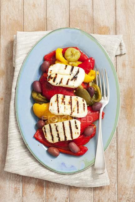 Roasted peppers with halloumi — Stock Photo