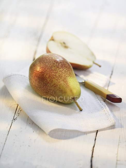 Pears on wooden table — Stock Photo
