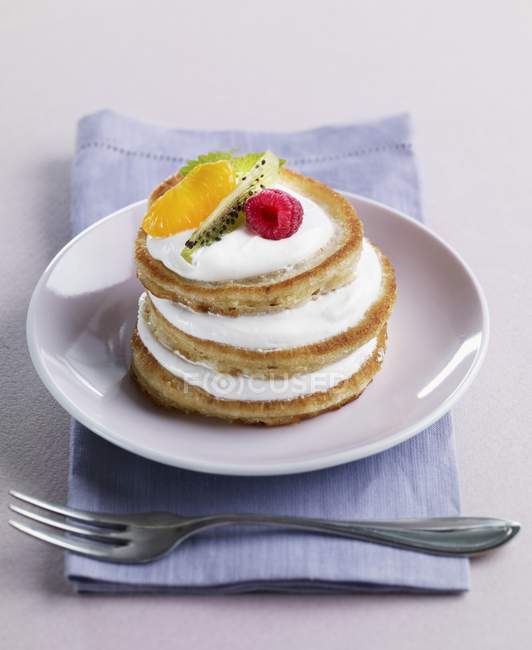 Pancake tower with creamy yogurt and fruits — Stock Photo
