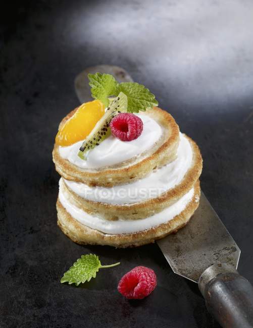 Pancake tower with fruits and mint — Stock Photo