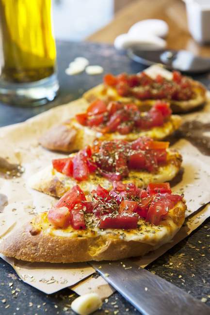 Cheese and tomato bruschetta — Stock Photo