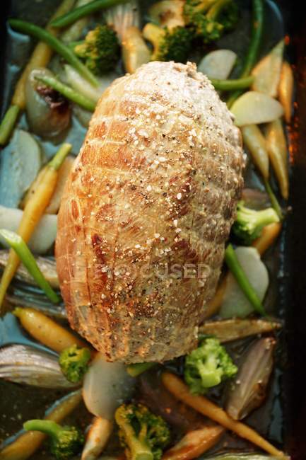 Roasted pork roulade with vegetables — Stock Photo