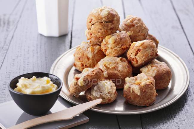 Cheese rolls with butter — Stock Photo