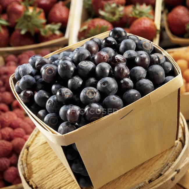 Blueberries in wooden basket — Stock Photo