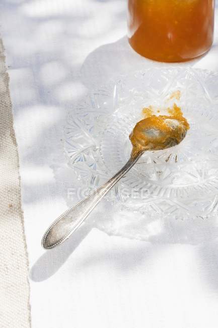 Medlar jam on spoon — Stock Photo