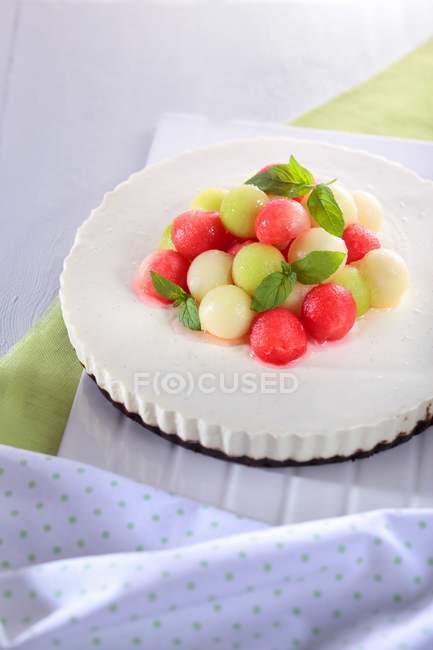 Cream cheesecake with melon — Stock Photo