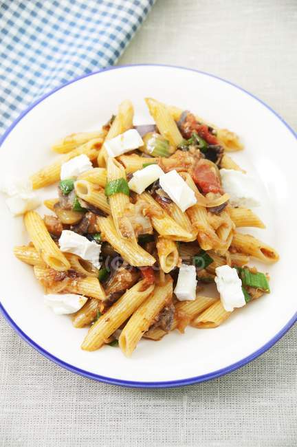 Penne pasta with aubergine and cheese — Stock Photo