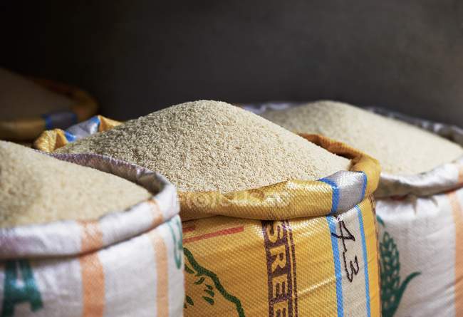 Три мешка риса — стоковое фото