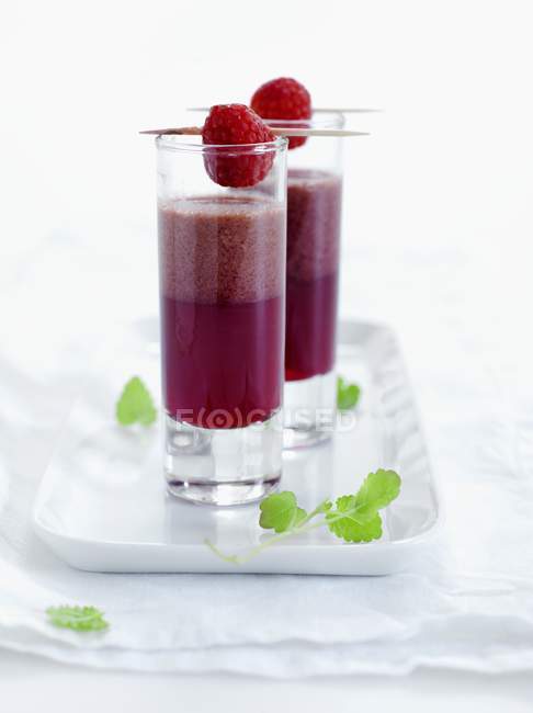 Raspberry smoothies on tray — Stock Photo