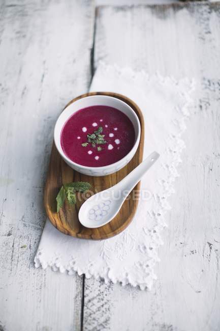 Beetroot soup with coconut and mint — Stock Photo