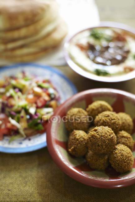 Falafel serving with salad bread and hummus — Stock Photo