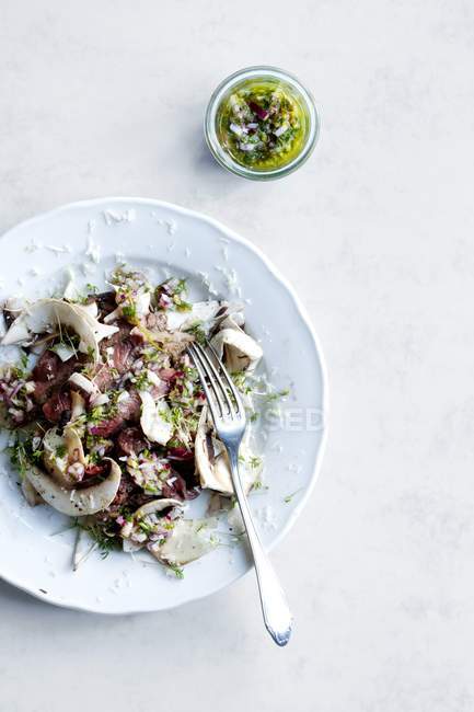 Closeup view of salad with mushrooms and herbs — Stock Photo