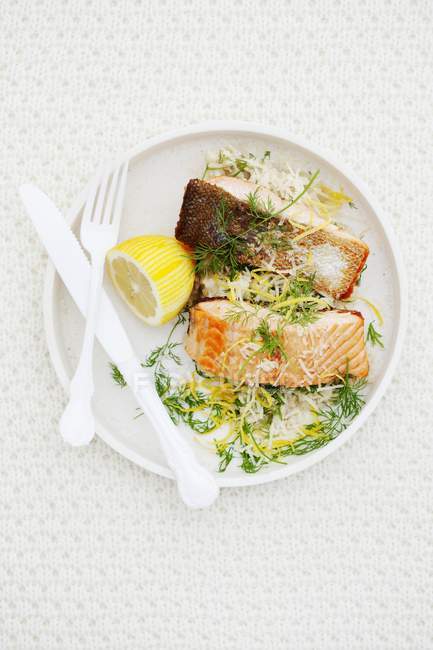 Salmon fillets with lemon — Stock Photo