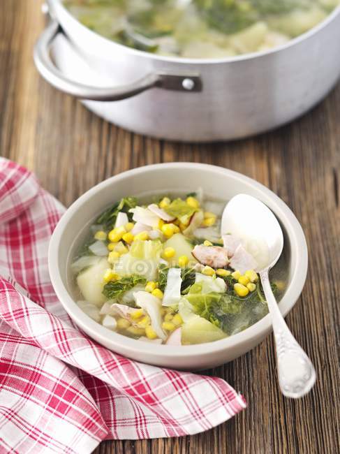 Savoy cabbage soup with ham and sweetcorn — Stock Photo